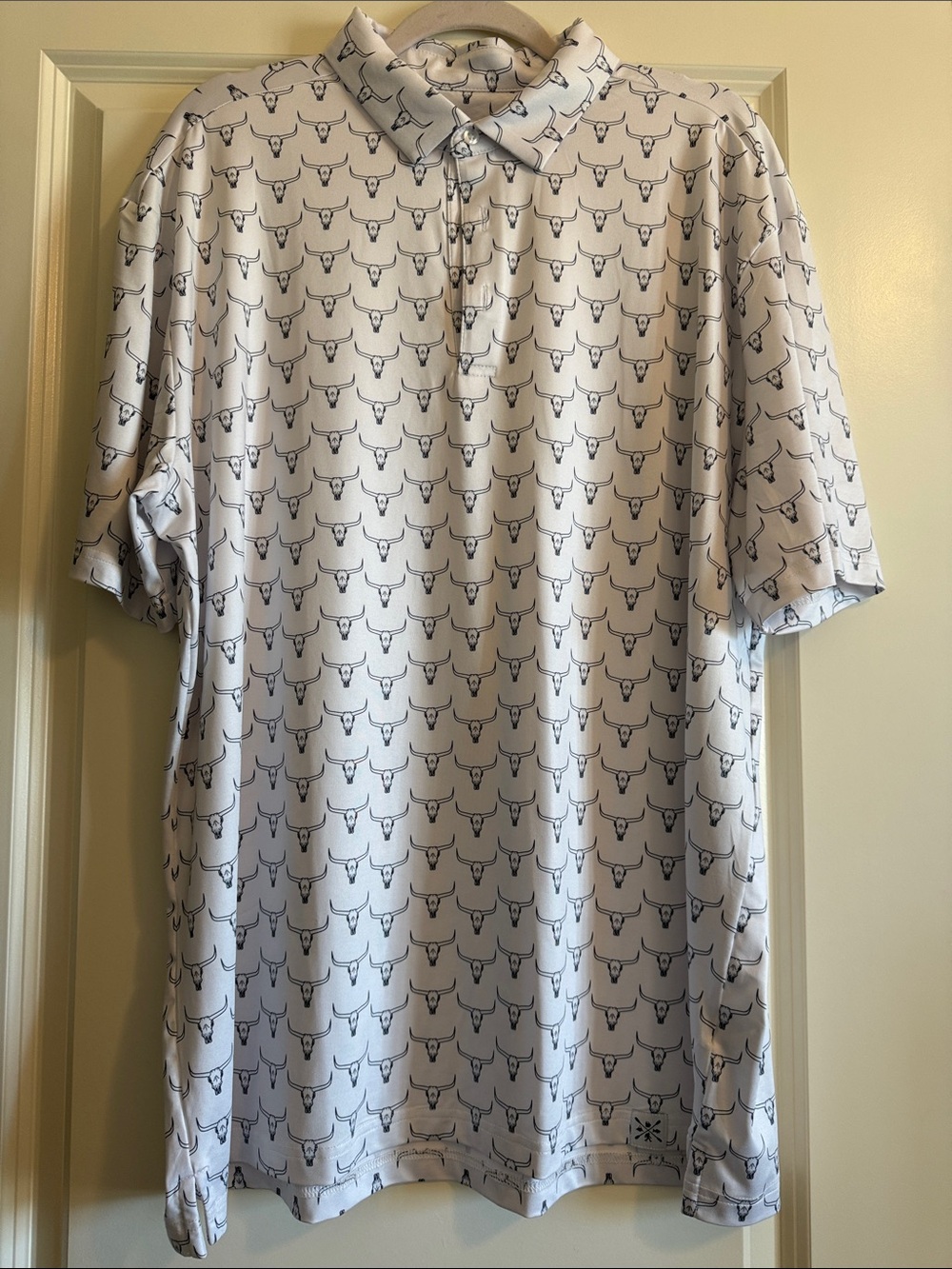 Saskuatch Outfitters Men's White Polo with Black Steer Skull Print